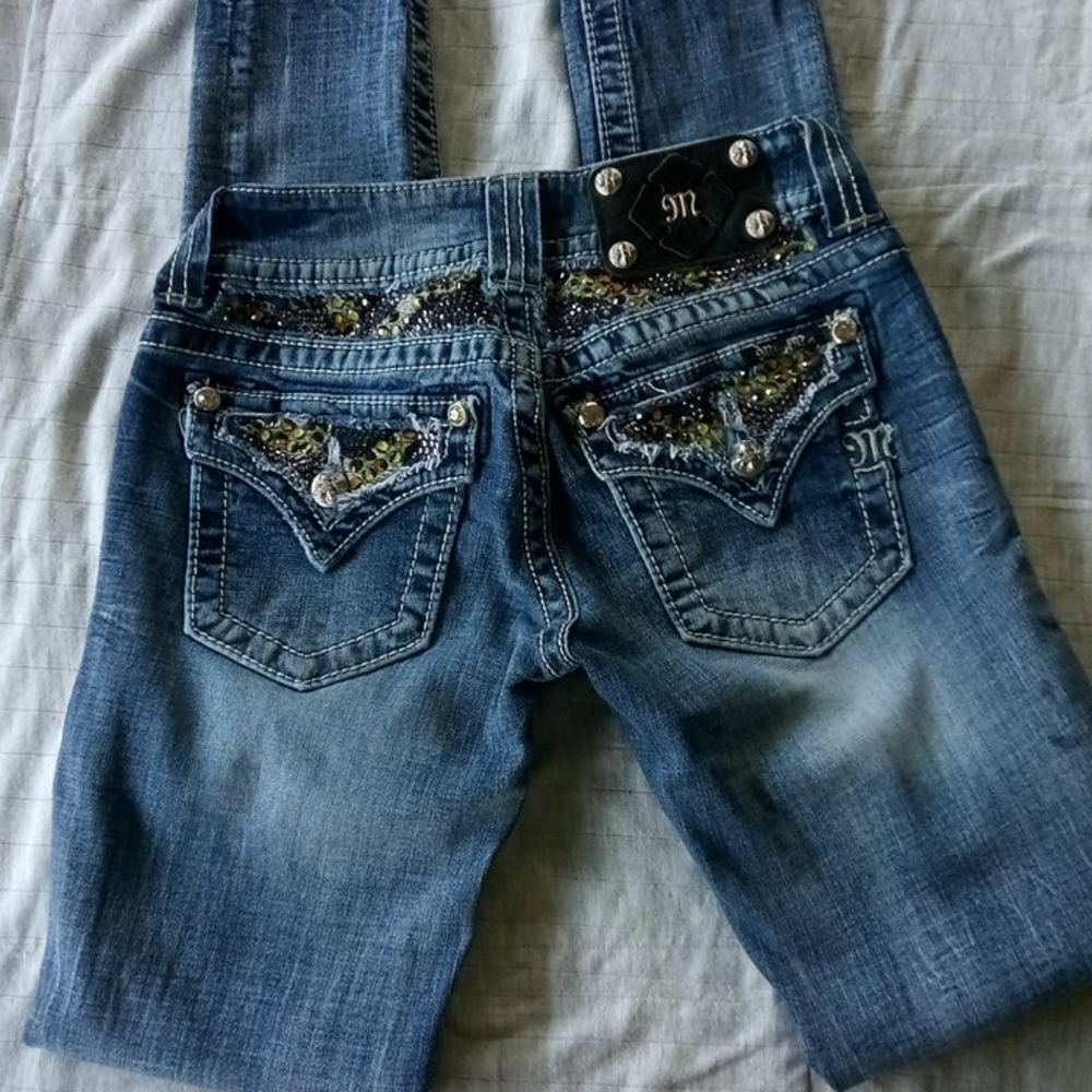 Miss Me skinny jeans waist is 25 and inseam is 30